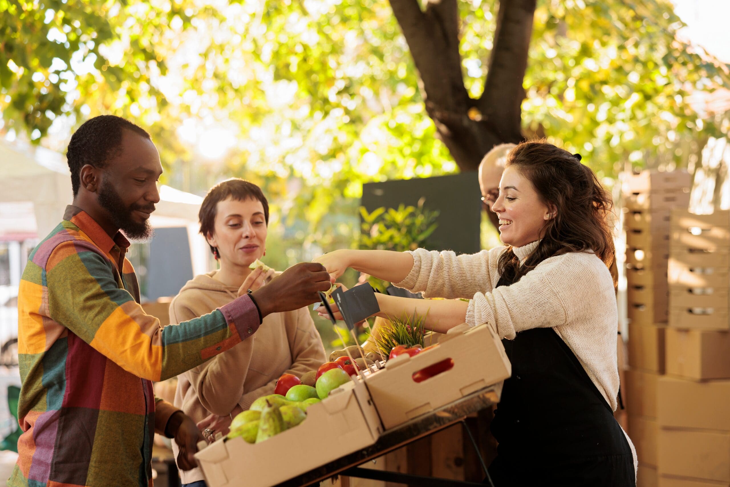 Vendor,Offering,Samples,To,Customers,While,Selling,Home-grown,Fruits,And